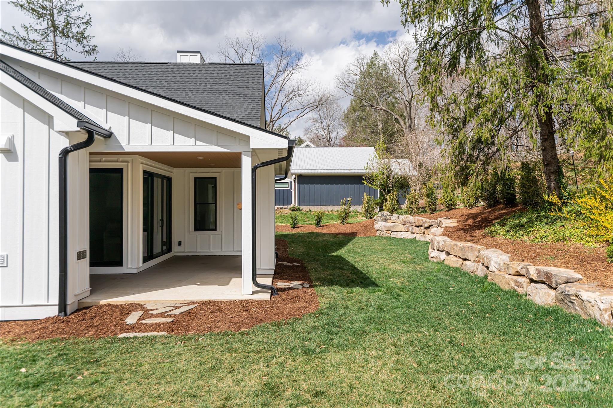251 Bee Tree Road Swannanoa, NC 28778 - Photo 43 of 46 a view of a patio with a yard