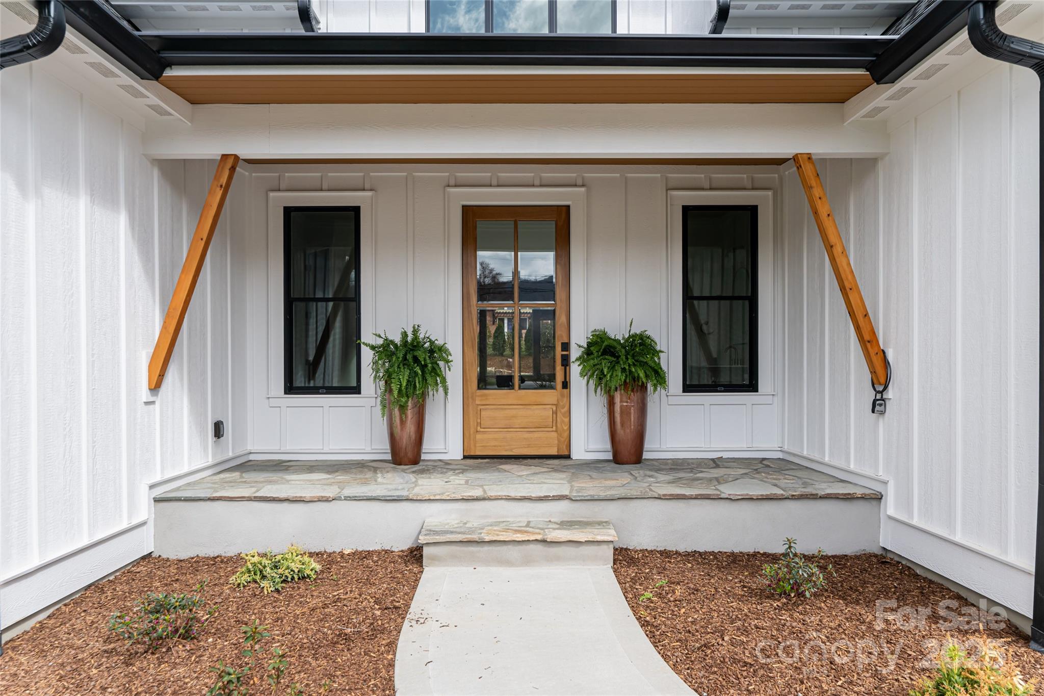 251 Bee Tree Road Swannanoa, NC 28778 - Photo 8 of 46 a view of entryway with a front door