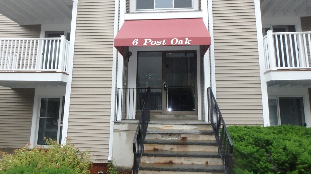 6 Post Oak Lane, Unit 4 Natick, MA 01760 - Photo 1 of 18 a view of a entryway door of the house