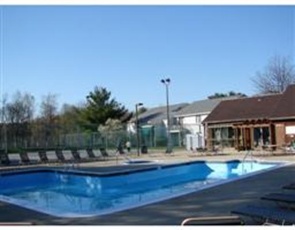 6 Post Oak Lane, Unit 4 Natick, MA 01760 - Photo 13 of 18 a view of swimming pool with outdoor seating and plants