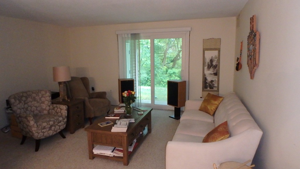 6 Post Oak Lane, Unit 4 Natick, MA 01760 - Photo 6 of 18 a living room with furniture and a window