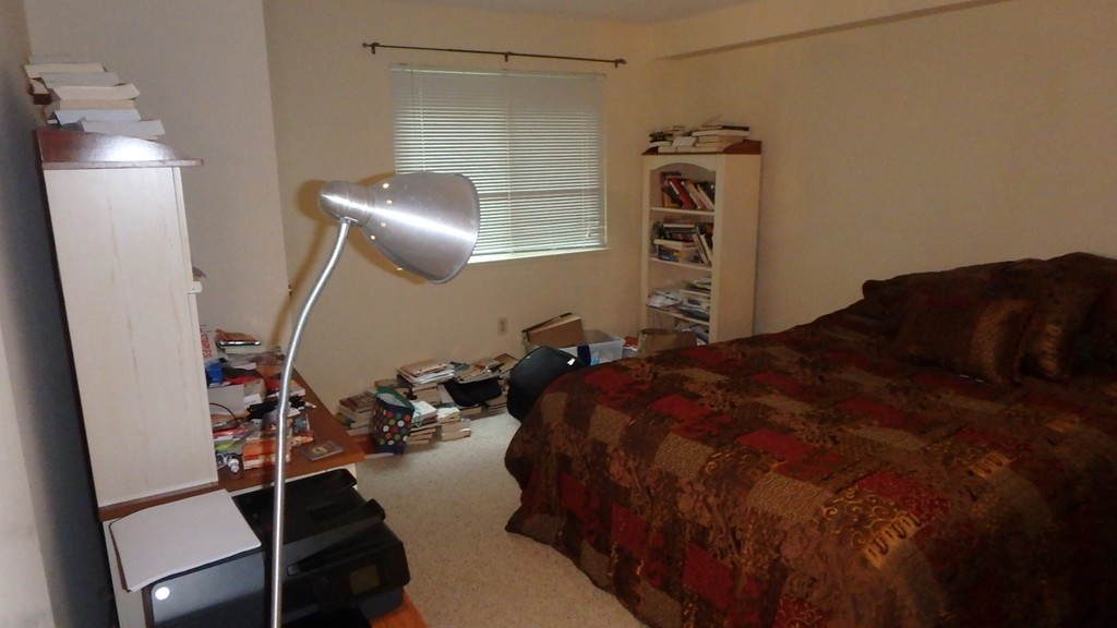 6 Post Oak Lane, Unit 4 Natick, MA 01760 - Photo 8 of 18 a bedroom with a bed and cabinets