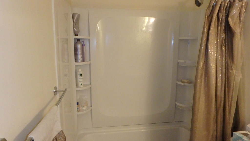 6 Post Oak Lane, Unit 4 Natick, MA 01760 - Photo 10 of 18 a bathroom with a shower