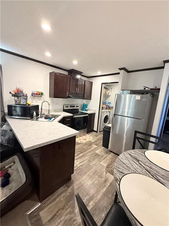 27 Manor Drive Bulger, PA 15019 - Photo 8 of 27 a kitchen with kitchen island a stove a sink and a refrigerator