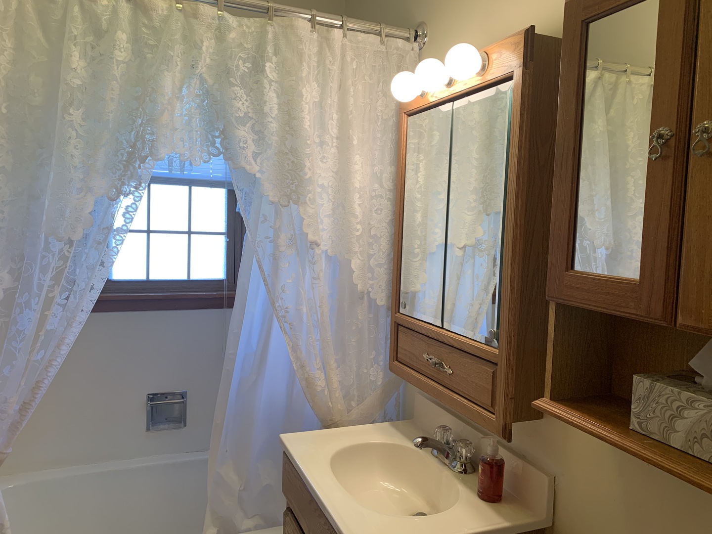 212 West Iowa Street Spring Valley, IL 61362 - Photo 15 of 18 a bathroom with a sink a toilet and a mirror
