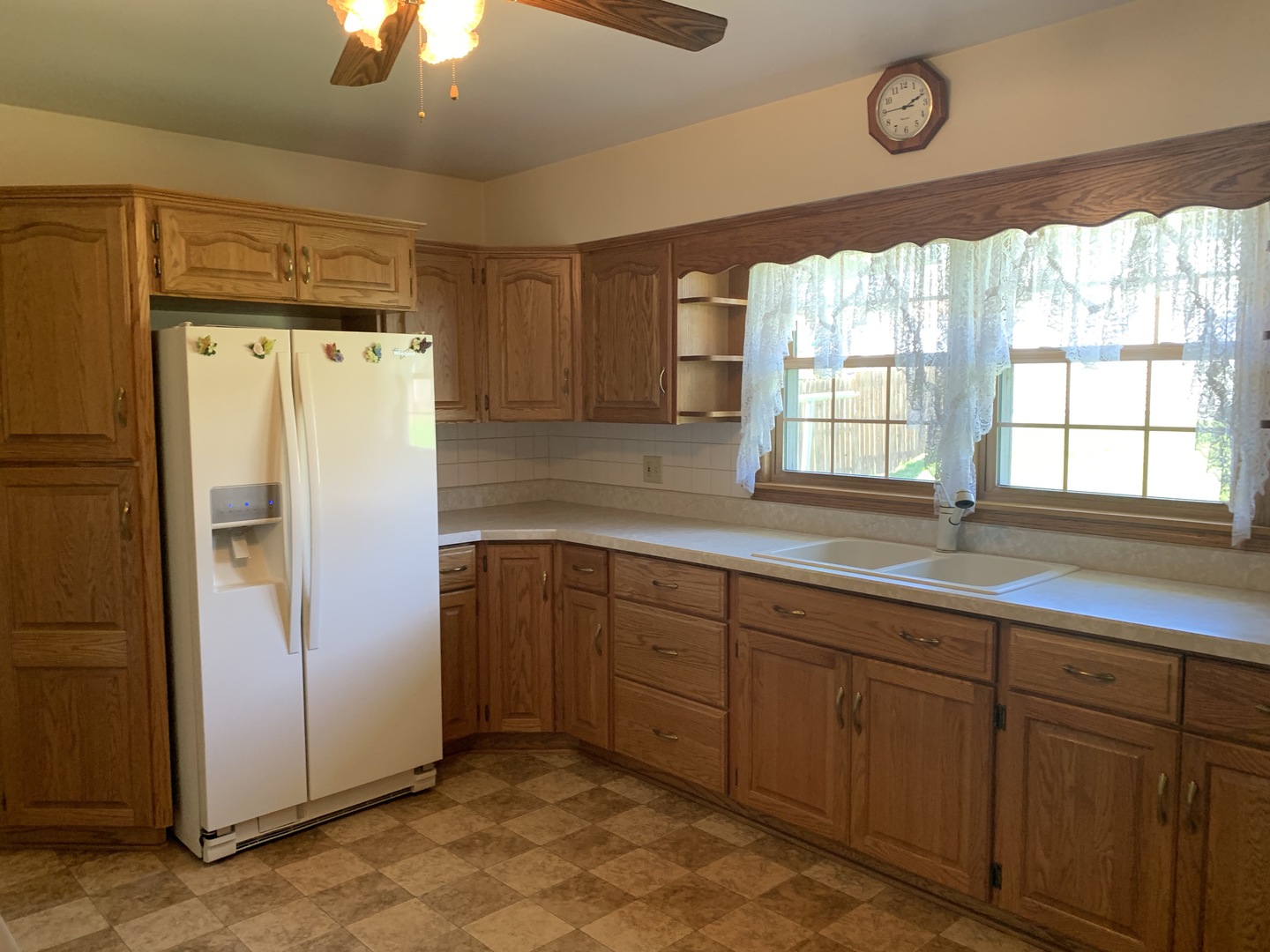 212 West Iowa Street Spring Valley, IL 61362 - Photo 8 of 18 a kitchen with stainless steel appliances granite countertop a refrigerator and a sink