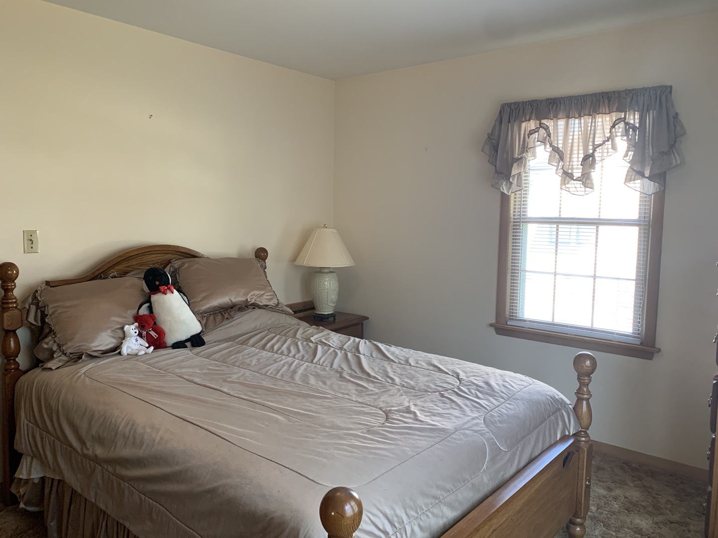 212 West Iowa Street Spring Valley, IL 61362 - Photo 10 of 18 a bedroom with a bed and window
