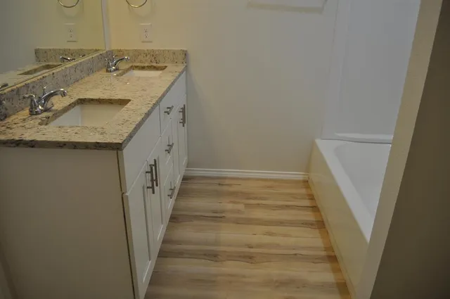 a bathroom with a toilet and sink