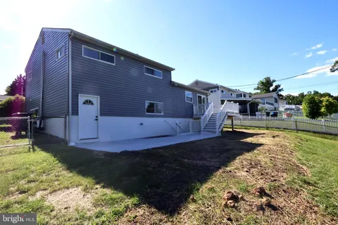 a view of a house with swimming pool