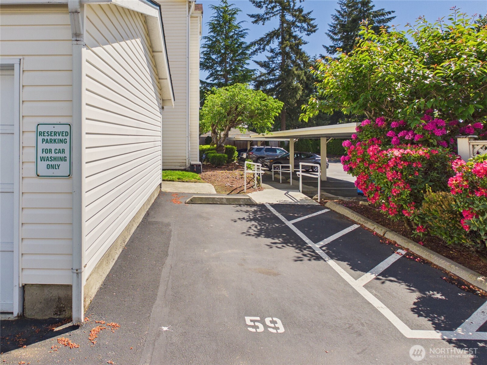 11002 Southeast Petrovitsky Road, Unit I102 Renton, WA 98055 - Photo 22 of 24 a view of a porch with furniture