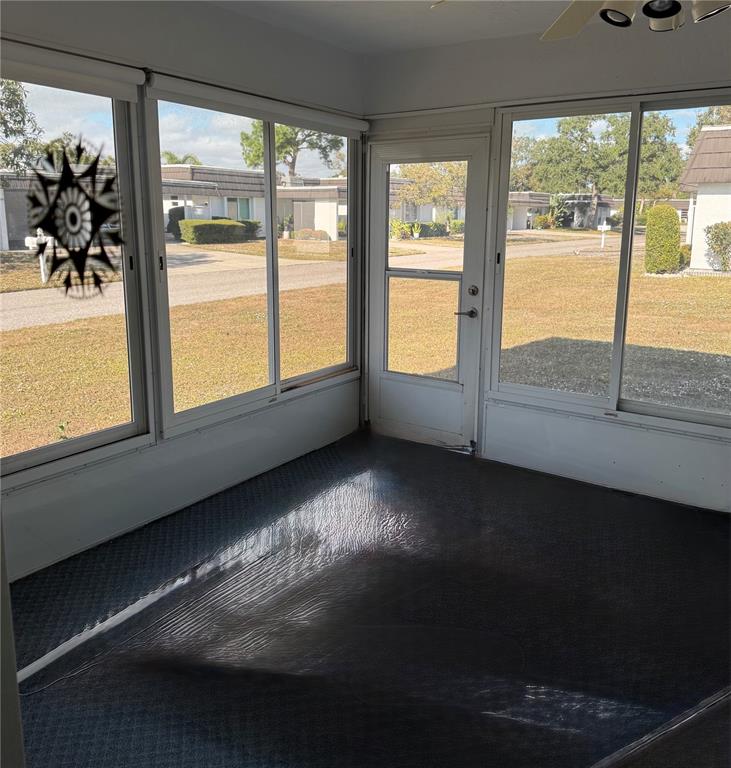 3957 Lakeside Way, Unit 143 Sarasota, FL 34232 - Photo 14 of 26 a view of an empty room and window