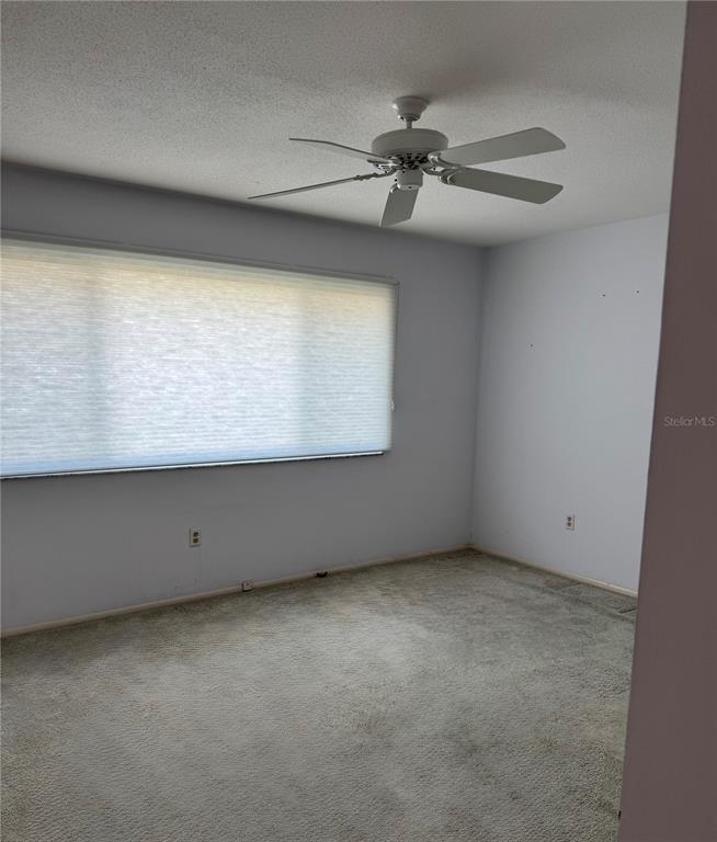 3957 Lakeside Way, Unit 143 Sarasota, FL 34232 - Photo 17 of 26 an empty room with a window