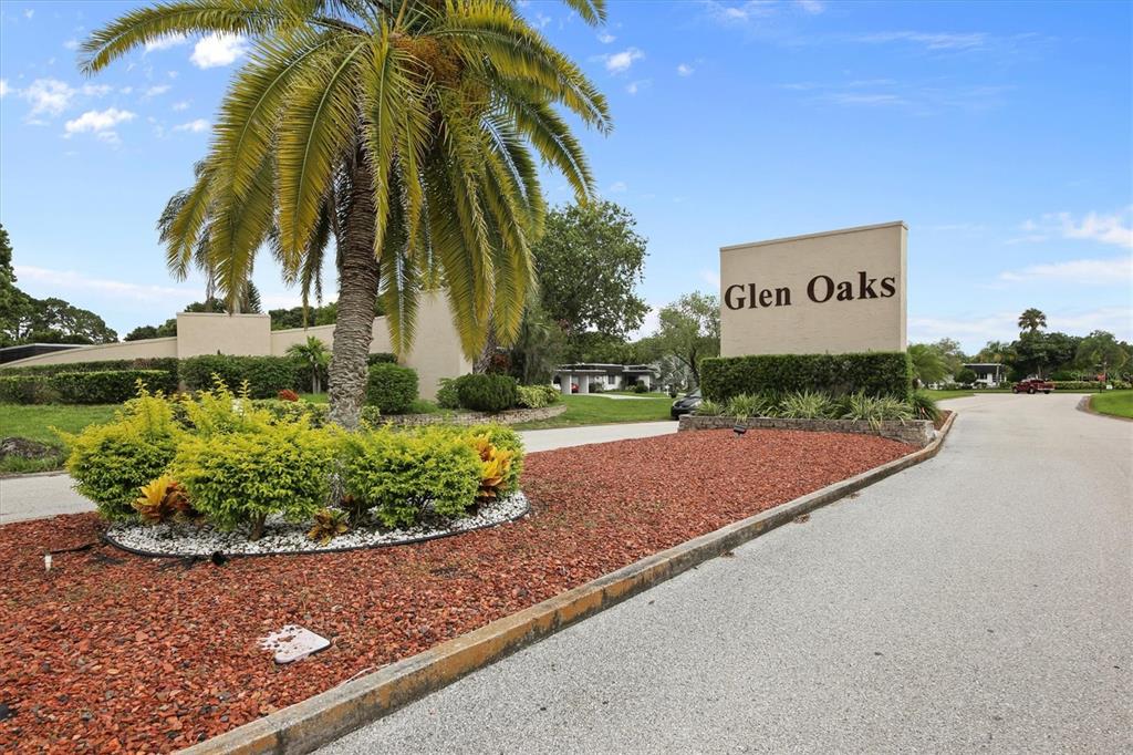 3957 Lakeside Way, Unit 143 Sarasota, FL 34232 - Photo 22 of 26 a view of a street with a park