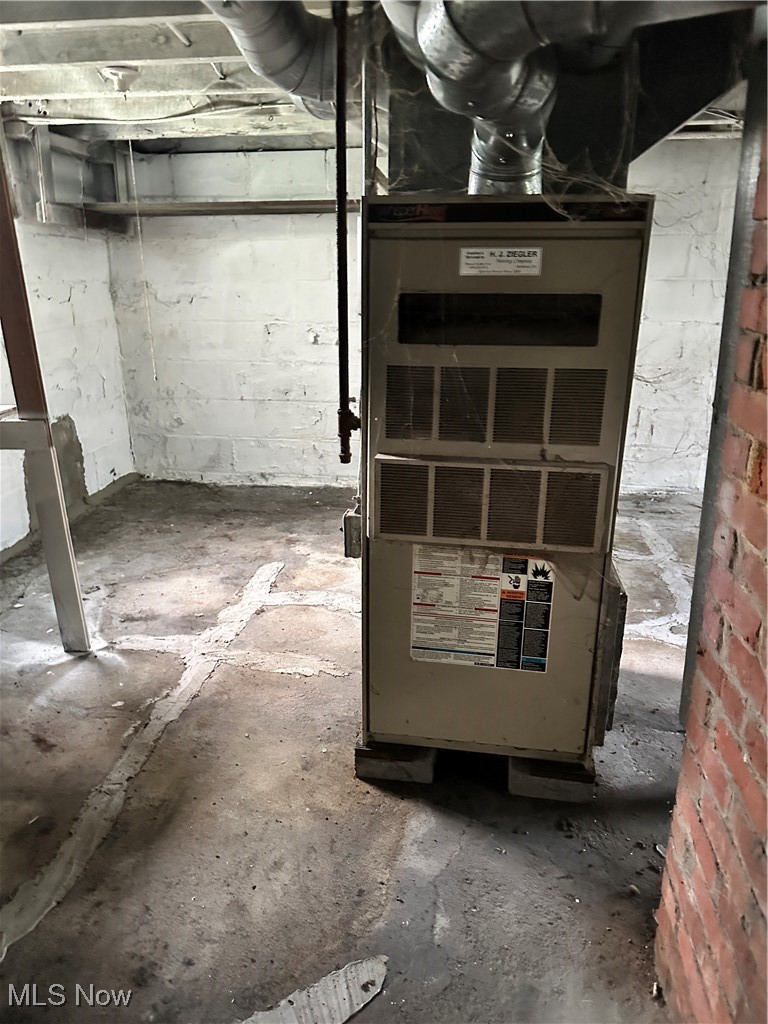 6144 Jefferson Road Ashtabula, OH 44004 - Photo 19 of 30 Utility room featuring heating unit