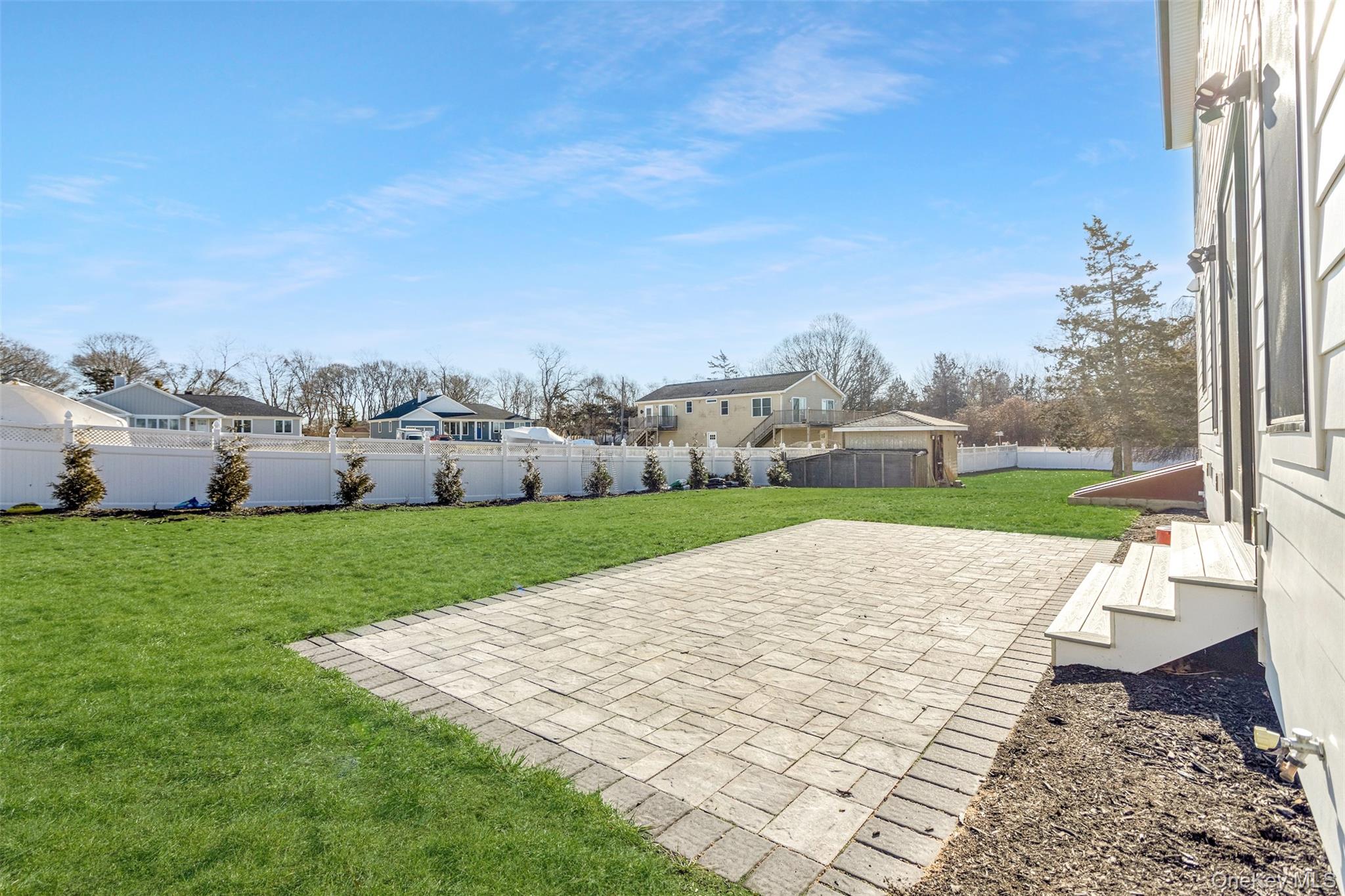 285 Sandy Beach Road Greenport, NY 11944 - Photo 13 of 31 Current Rear Yard & Patio