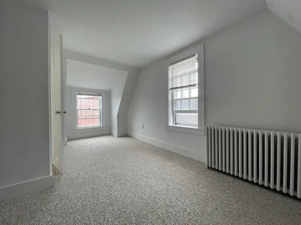 a view of a living room and a window