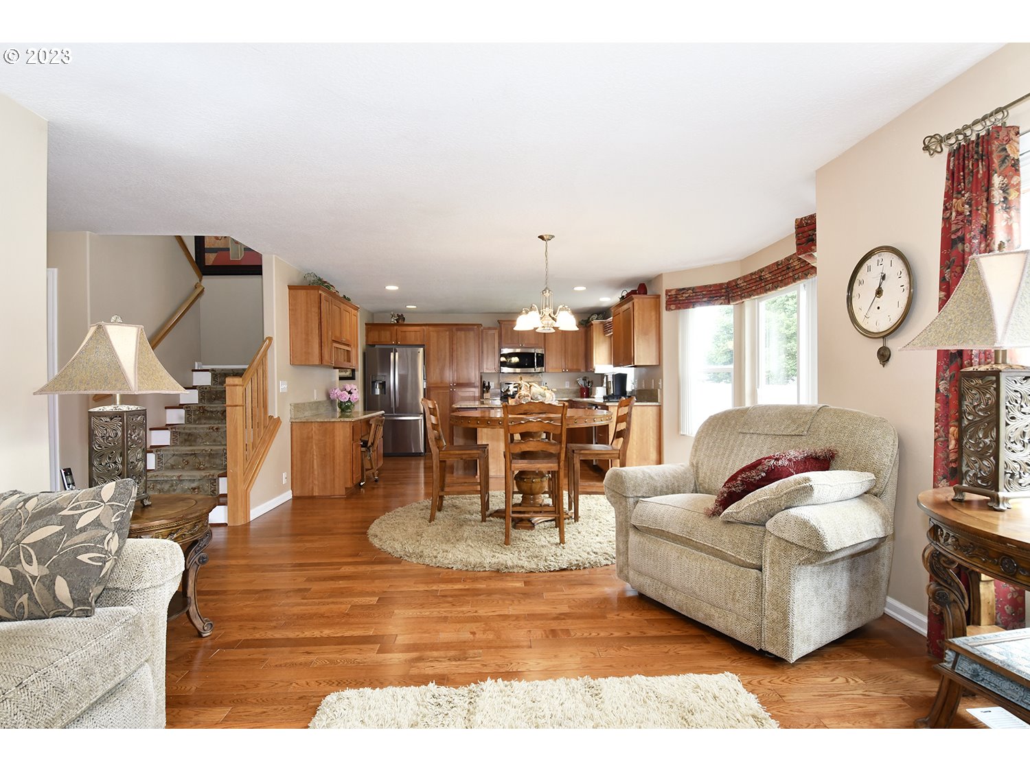 2112 Northwest 10th Street Battle Ground, WA 98604 - Photo 11 of 29 a living room with furniture and a clock