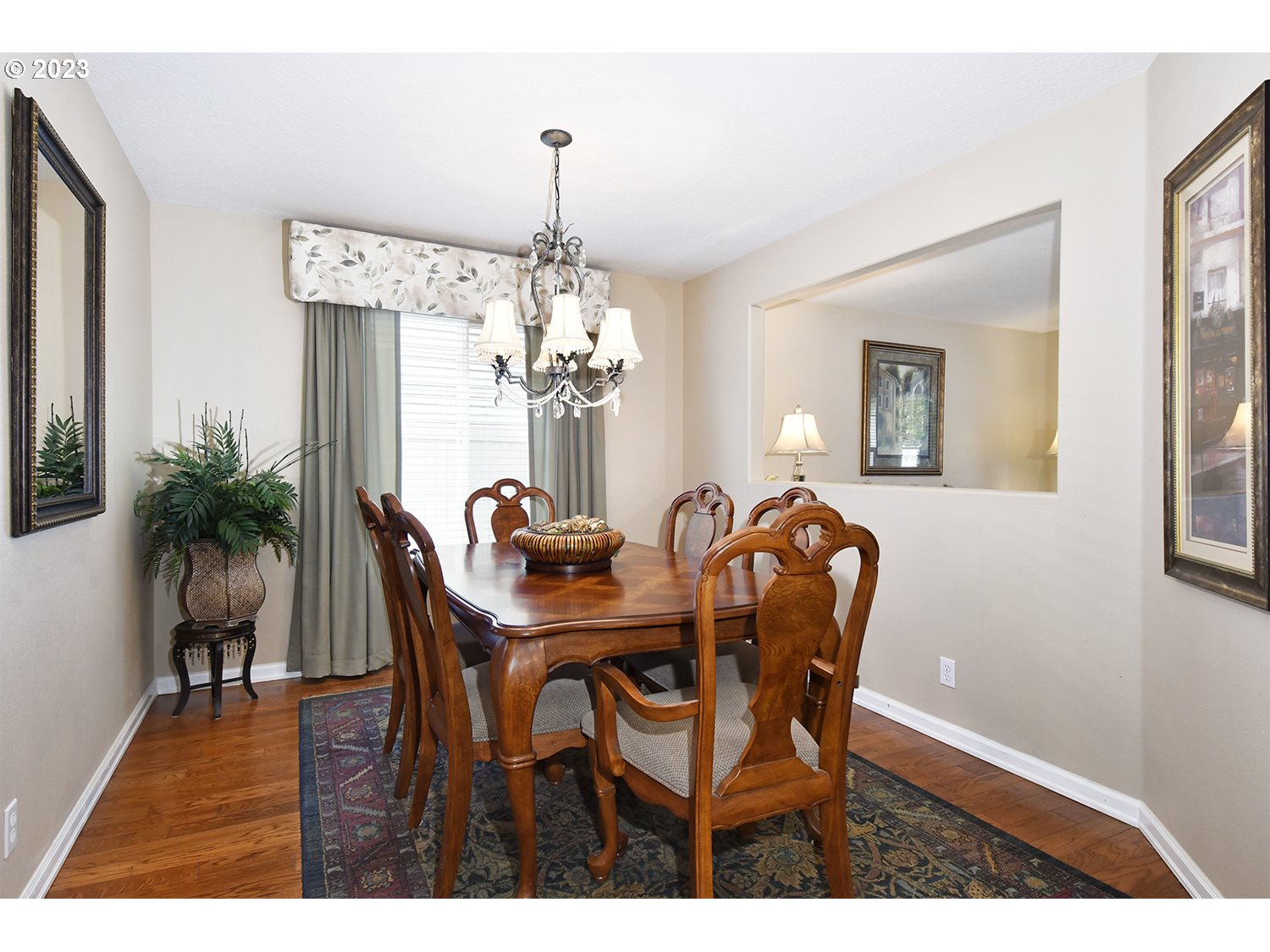 2112 Northwest 10th Street Battle Ground, WA 98604 - Photo 7 of 29 a view of a dining room with furniture and chandelier