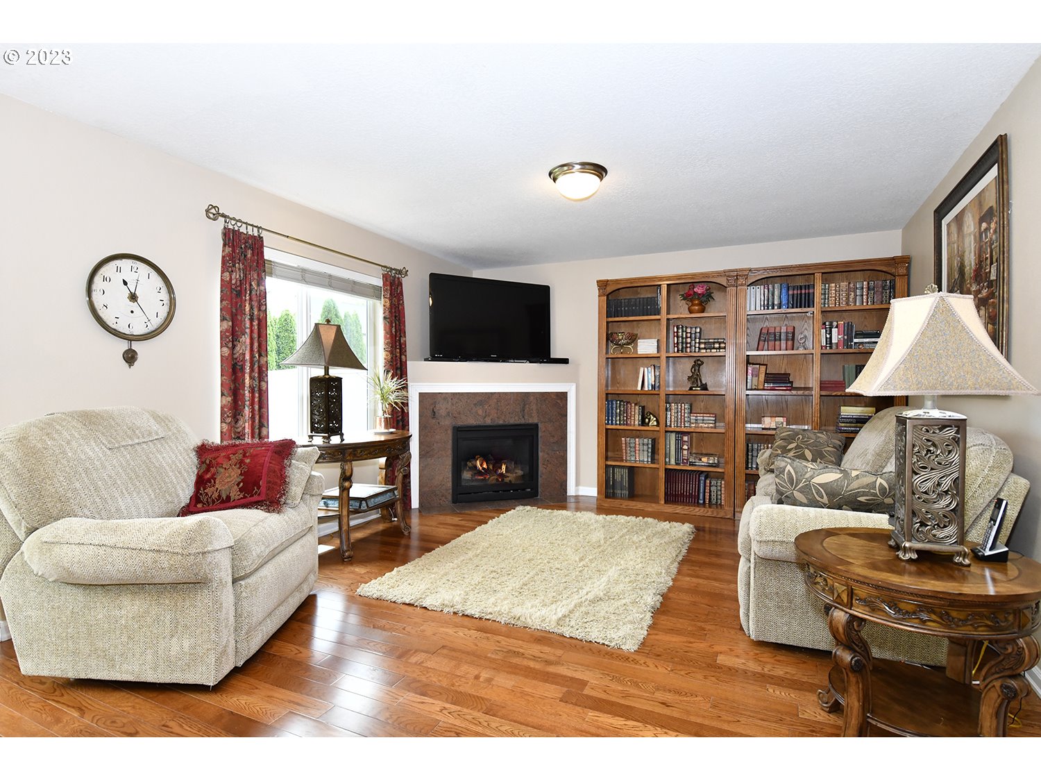 2112 Northwest 10th Street Battle Ground, WA 98604 - Photo 9 of 29 a living room with furniture and a fireplace