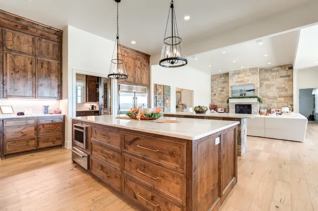 a view of a hall with a ceiling fan