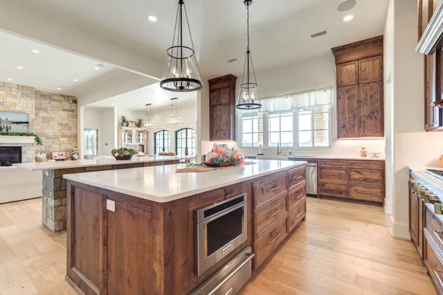 a bathroom with a sink a toilet and vanity