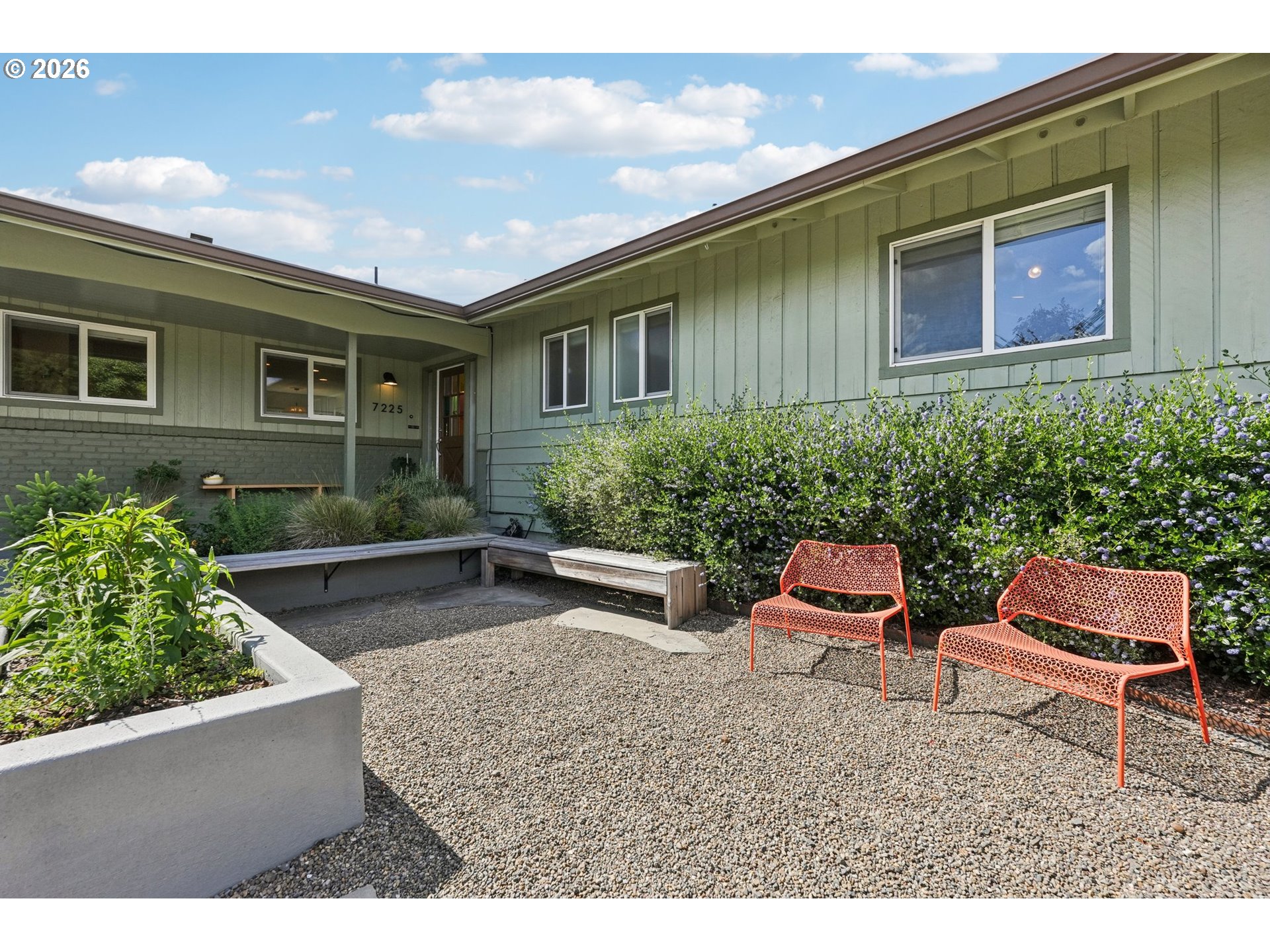 7225 Southwest 13th Avenue Portland, OR 97219 - Photo 3 of 48 a backyard of a house with outdoor seating