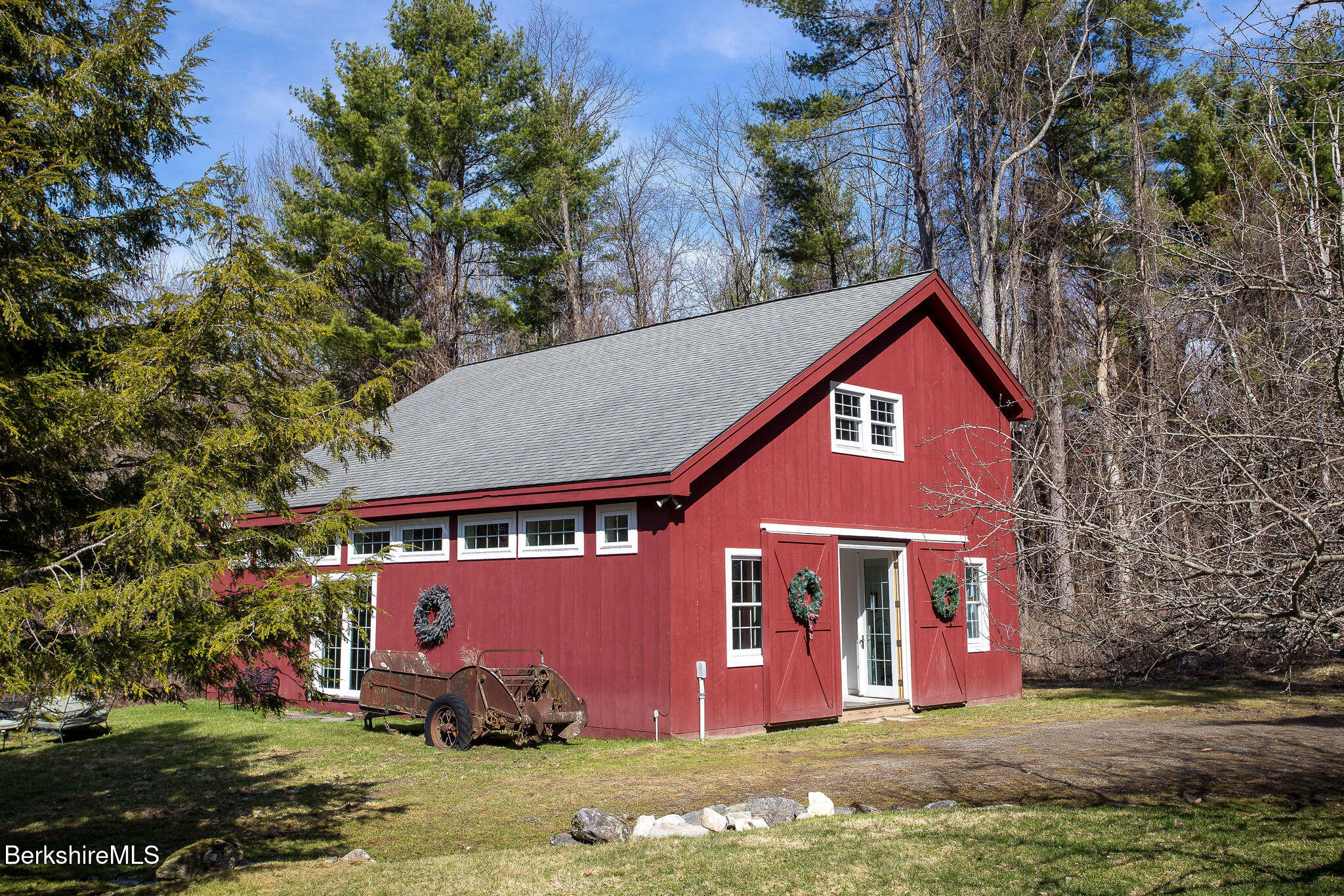 14 Old Tree Farm Road Stockbridge, MA 01266 - Photo 34 of 50 a front view of a house with a yard