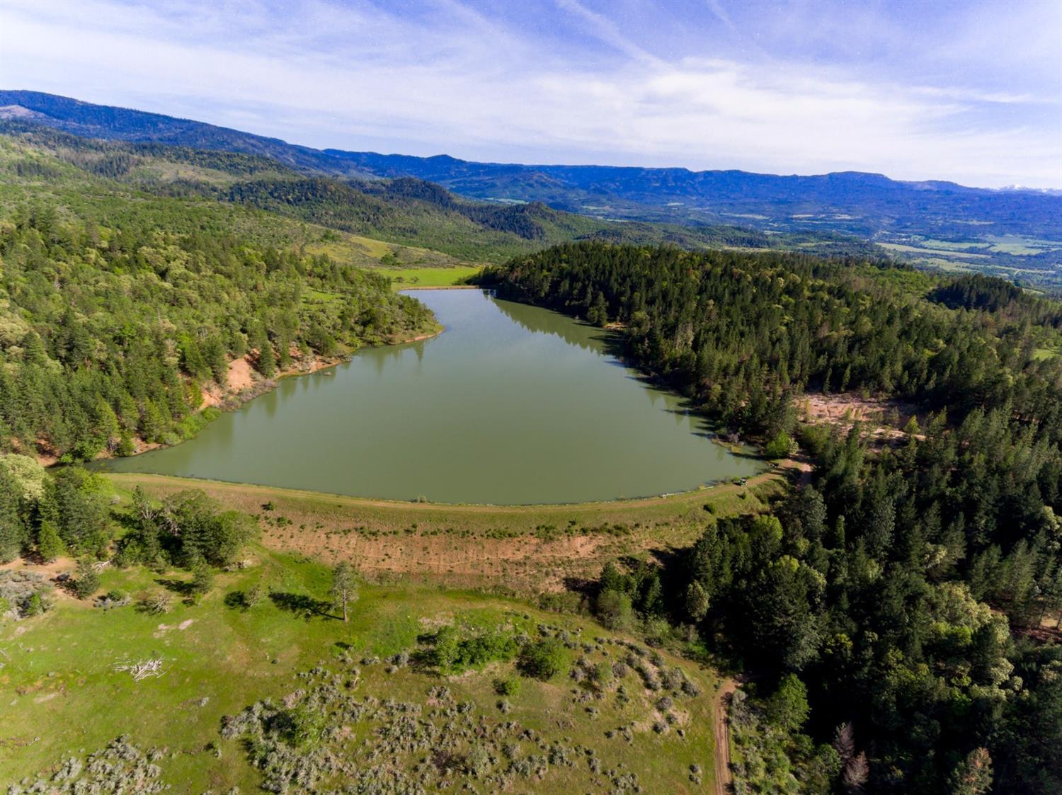 1888 South Obenchain Road Eagle Point, OR 97524 - Photo 1 of 34 a view of lake with mountain