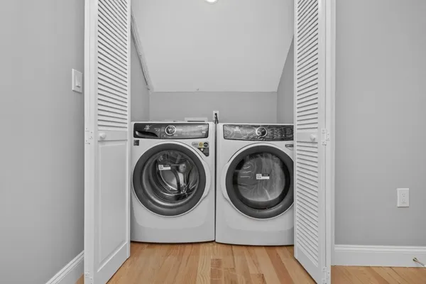 a utility room with dryer and washer