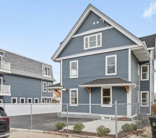 a front view of a house with street