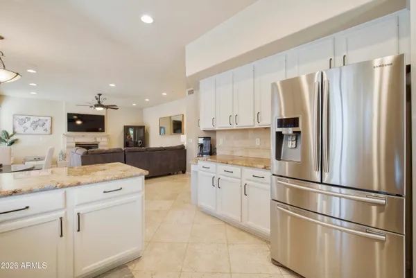 a kitchen with a stove and a microwave