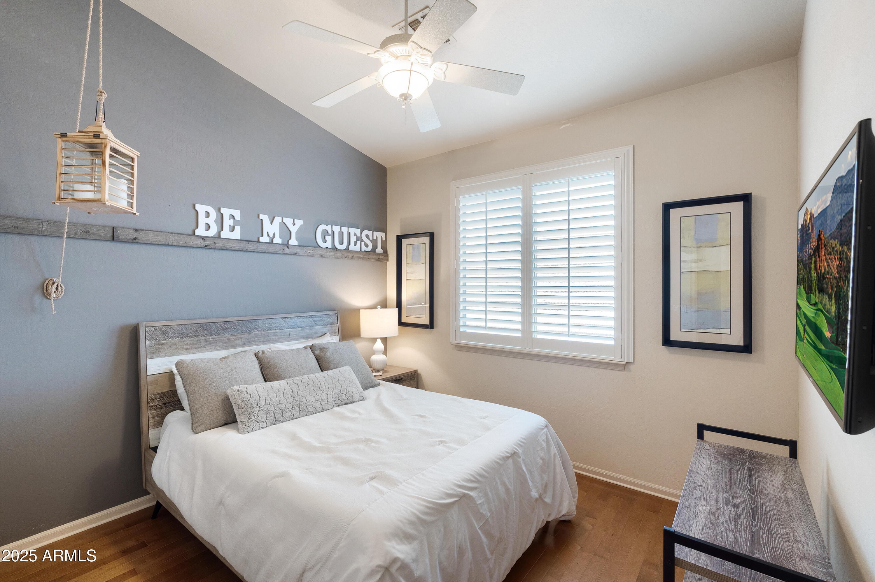 6419 East Betty Elyse Lane Scottsdale, AZ 85254 - Photo 14 of 33 a bedroom with a large bed and a window