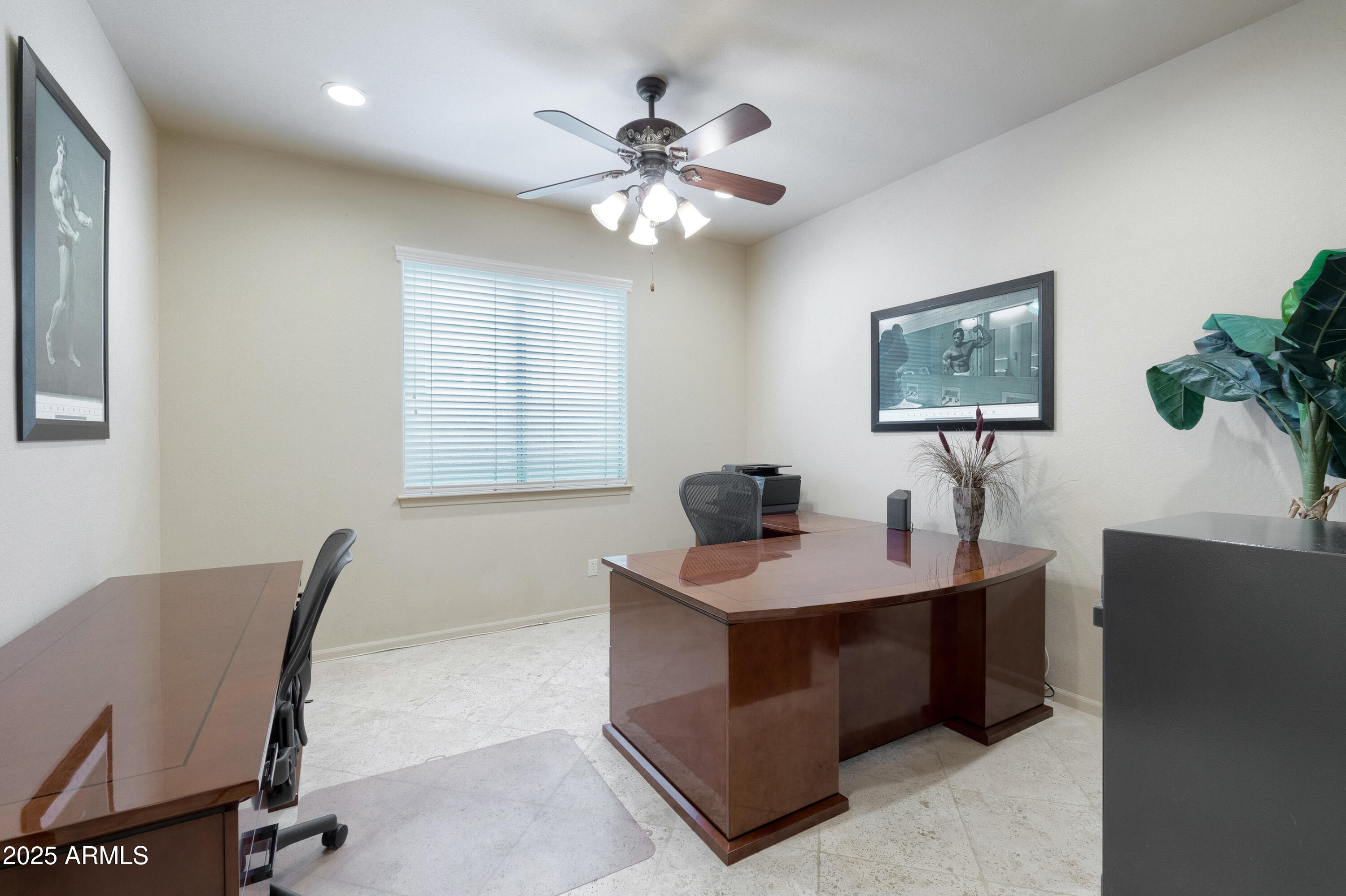 6419 East Betty Elyse Lane Scottsdale, AZ 85254 - Photo 19 of 33 a view of a dining room with furniture and chandelier