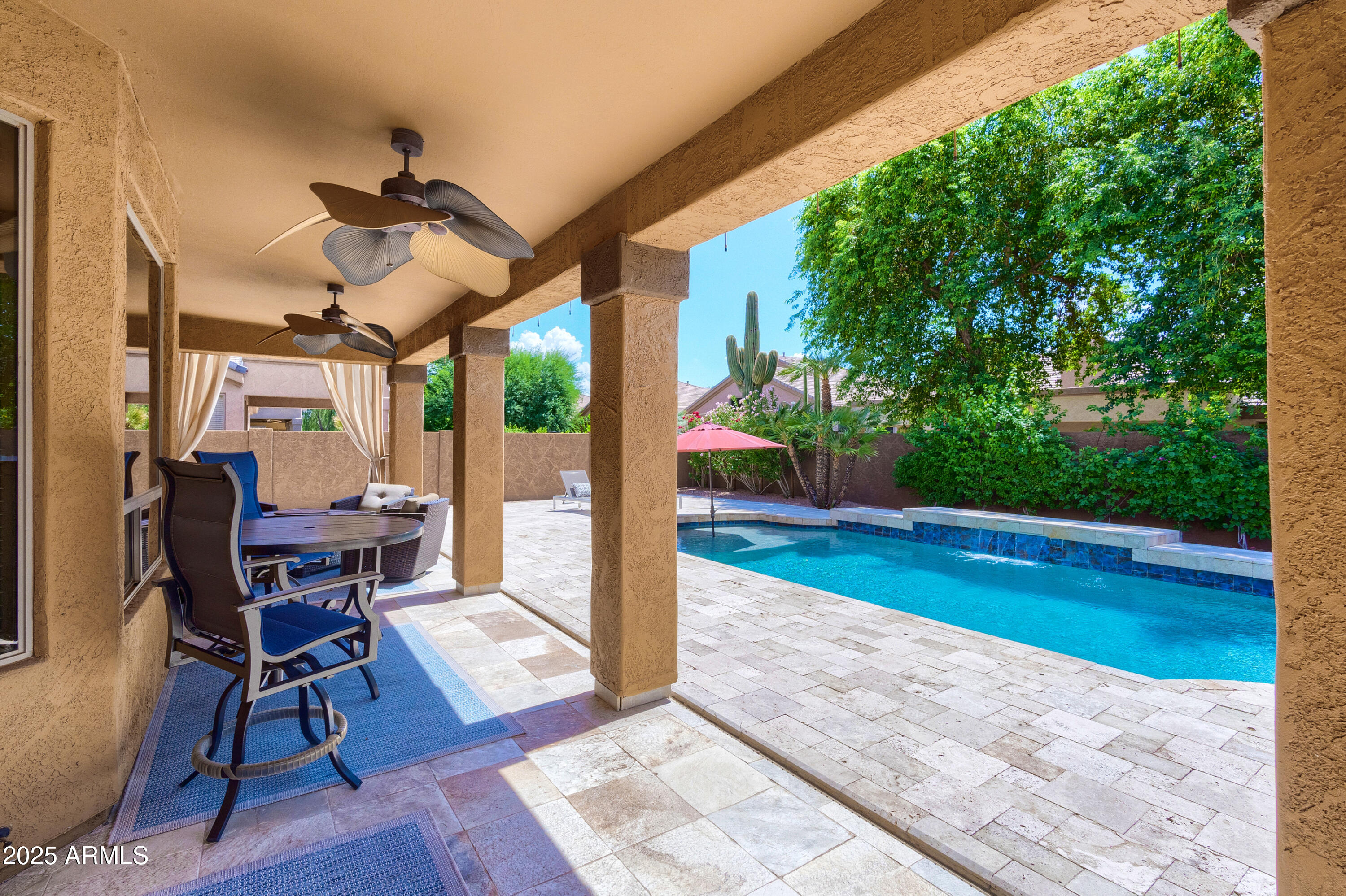 6419 East Betty Elyse Lane Scottsdale, AZ 85254 - Photo 21 of 33 a view of a patio in a backyard