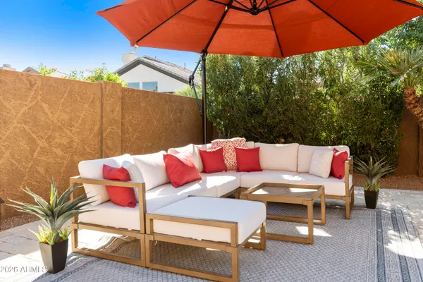 a view of a balcony with wooden floor