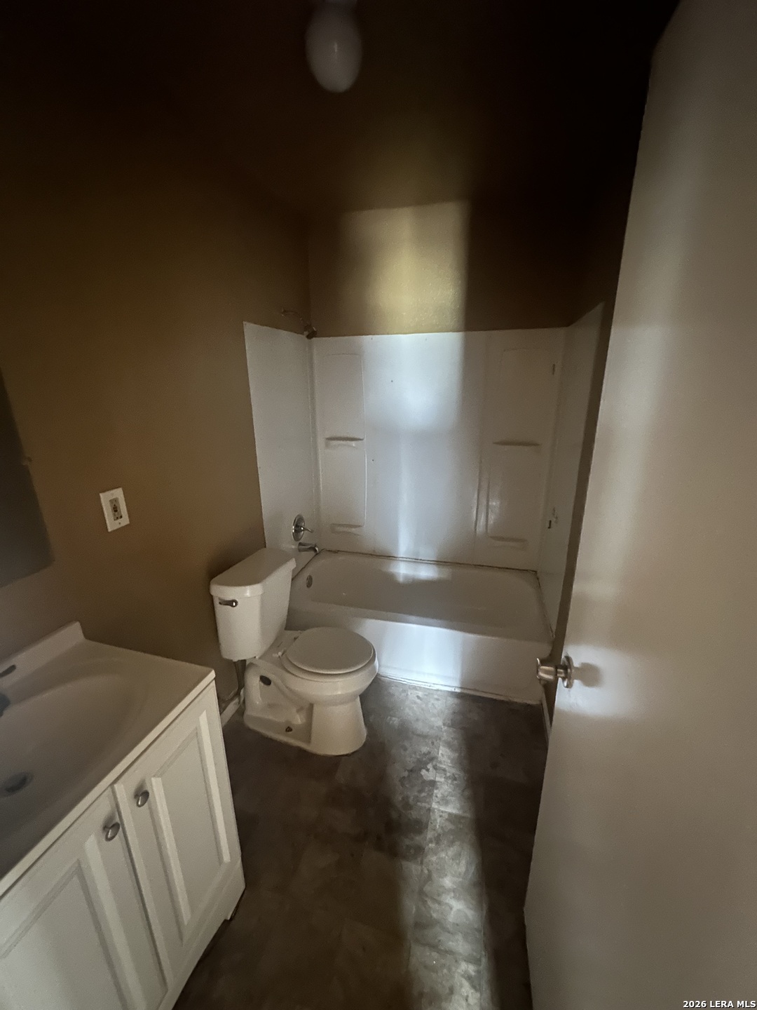 510 Riley Street Seguin, TX 78155 - Photo 10 of 24 a bathroom with a toilet and a shower