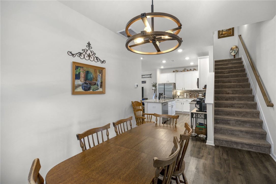 339 Village Boundary Anderson, SC 29621 - Photo 13 of 36 This inviting space combines a functional kitchen with an open dining area, perfect for everyday living.