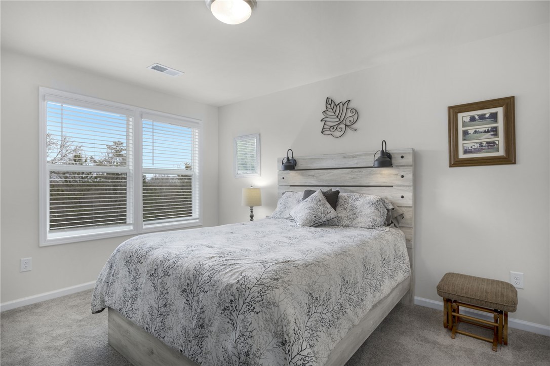339 Village Boundary Anderson, SC 29621 - Photo 21 of 36 This cozy room offers abundant natural light and soft carpeting, perfect for peaceful relaxation.