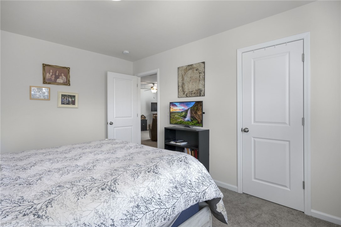 339 Village Boundary Anderson, SC 29621 - Photo 22 of 36 This cozy bedroom provides a comfortable retreat with soft carpet flooring.