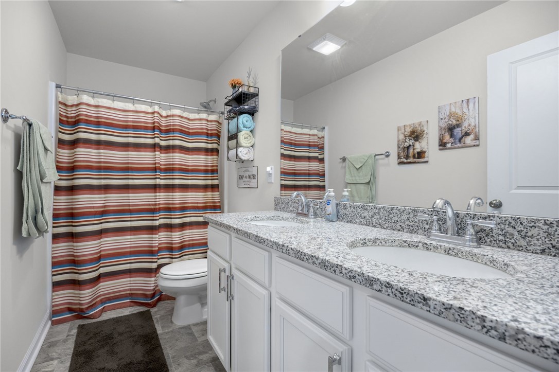 339 Village Boundary Anderson, SC 29621 - Photo 25 of 36 This bright bathroom features a spacious dual vanity with ample counter space and a refreshing shower.