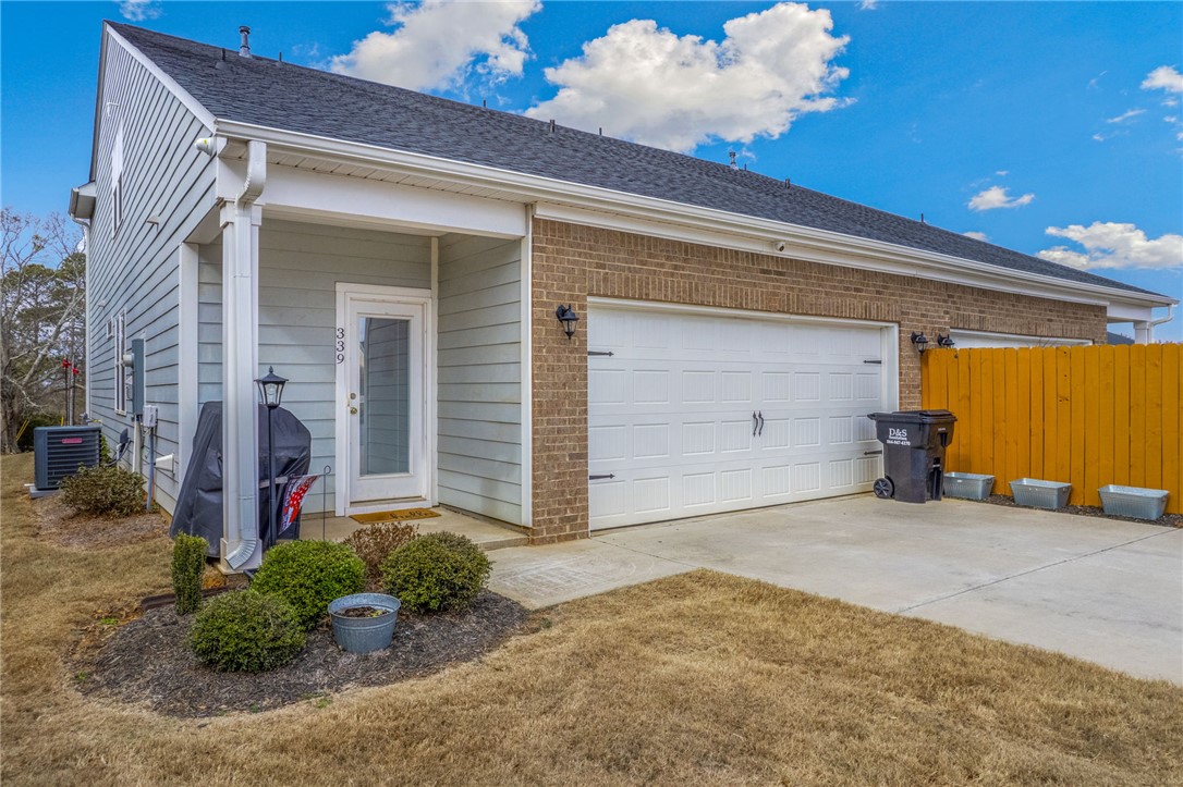 339 Village Boundary Anderson, SC 29621 - Photo 28 of 36 This residence features a convenient attached garage and a welcoming front entrance.