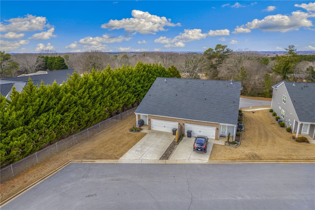 339 Village Boundary Anderson, SC 29621 - Photo 31 of 36 This captivating aerial view showcases two distinct residential structures.