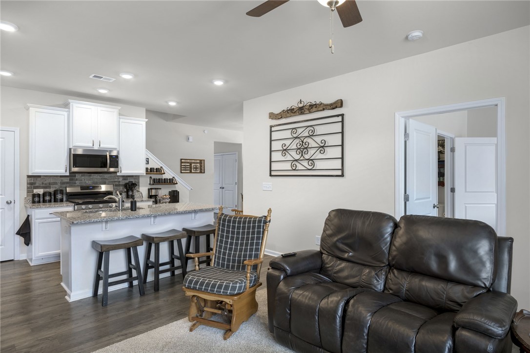339 Village Boundary Anderson, SC 29621 - Photo 6 of 36 This inviting space seamlessly blends living and cooking with modern conveniences.
