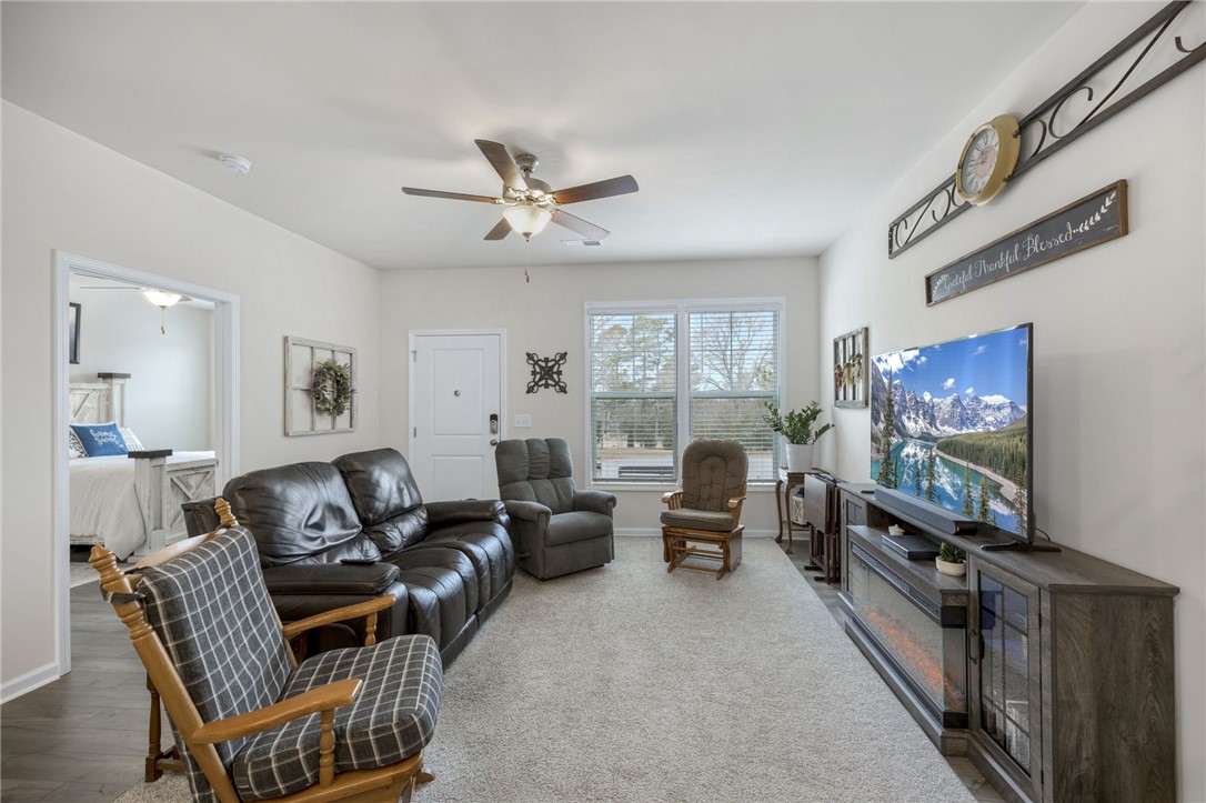 339 Village Boundary Anderson, SC 29621 - Photo 8 of 36 This living area offers comfort and light, perfect for relaxation and everyday living.