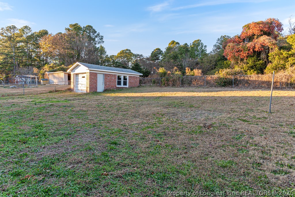 922 Rancho Drive Fayetteville, NC 28303 - Photo 4 of 21 a view of a house with a yard