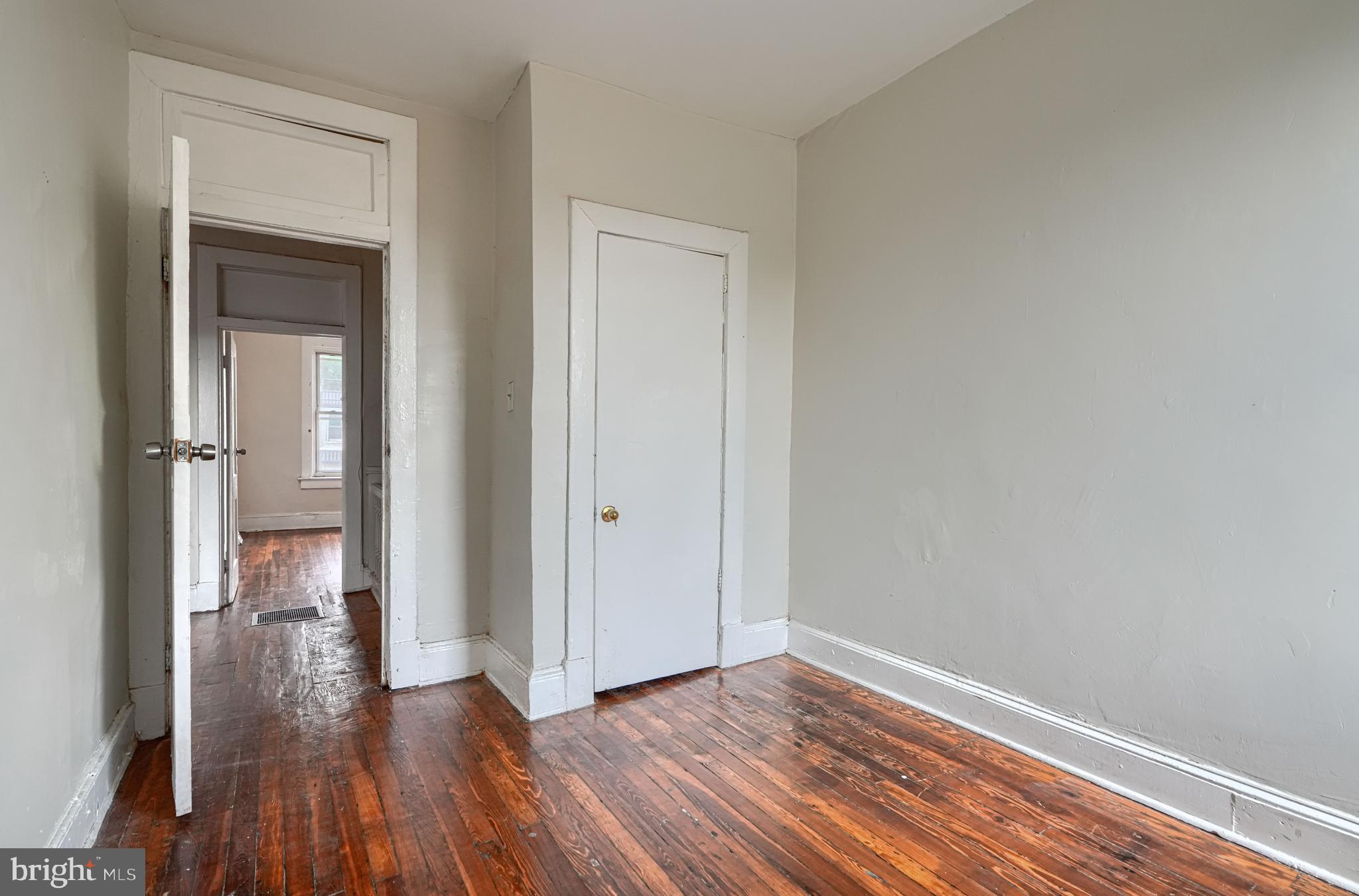 4806 Reisterstown Road Baltimore, MD 21215 - Photo 23 of 34 a view of a hallway with wooden floor and closet
