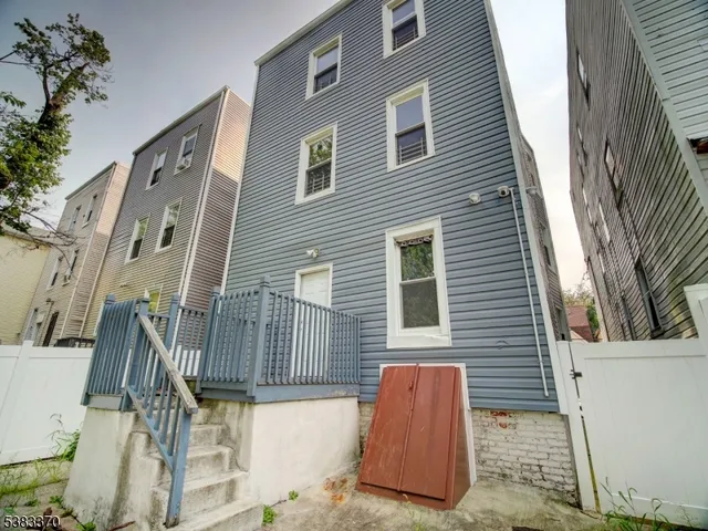 a view of front of house with a street