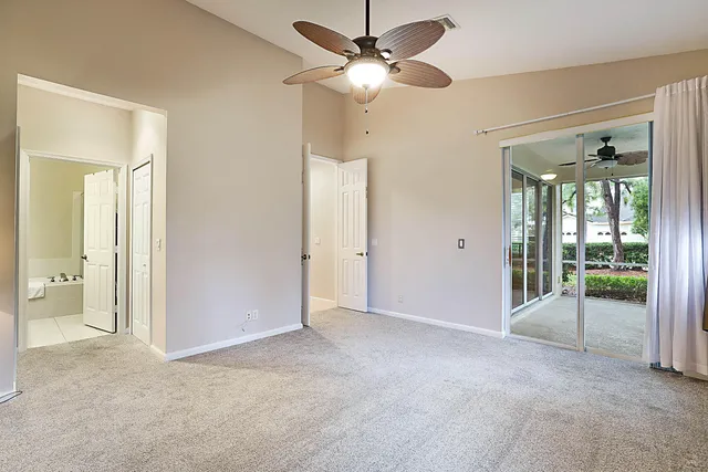 a view of empty room with fan
