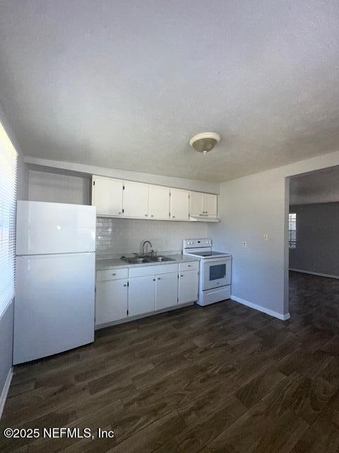 3254 Phyllis Street Jacksonville, FL 32205 - Photo 6 of 11 a kitchen with granite countertop a stove and a refrigerator