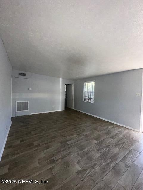 3254 Phyllis Street Jacksonville, FL 32205 - Photo 8 of 11 a view of an empty room and window